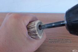 Make a hole with the 10mm bit from end to end.