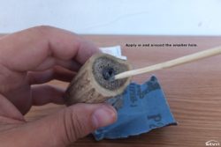 Apply it in and around the smaller hole.