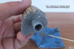 Smear epoxy all over the antler to seal the pores.