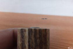 Let the tube slightly protrude from the antler.