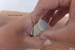 Place the rubber band.