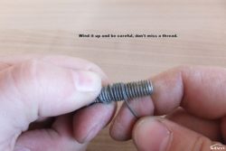 Winding wire on the bolt.