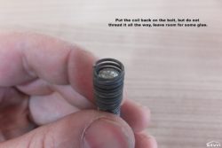 Put the coil back on the bolt, but do not thread it all the way, leave room for some glue.