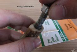 Gently push in the bolt.