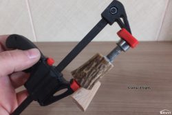 Clamped antler handle.