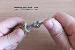 Remove the bolt, if it won't budge repeat the heating/cooling steps.