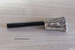 Antler handle with replaceable firesteel.