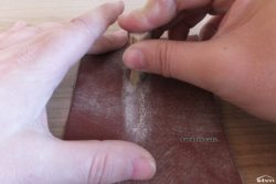 Sanding the antler handle.